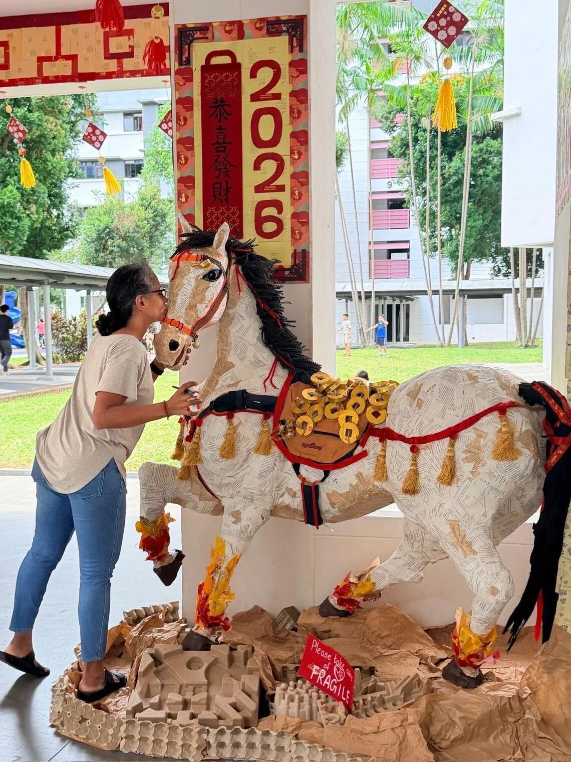 A horse-picious labour of love at a Cantonment Close void deck for CNY